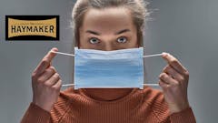 image-of-woman-removing-a-pandemic-mask