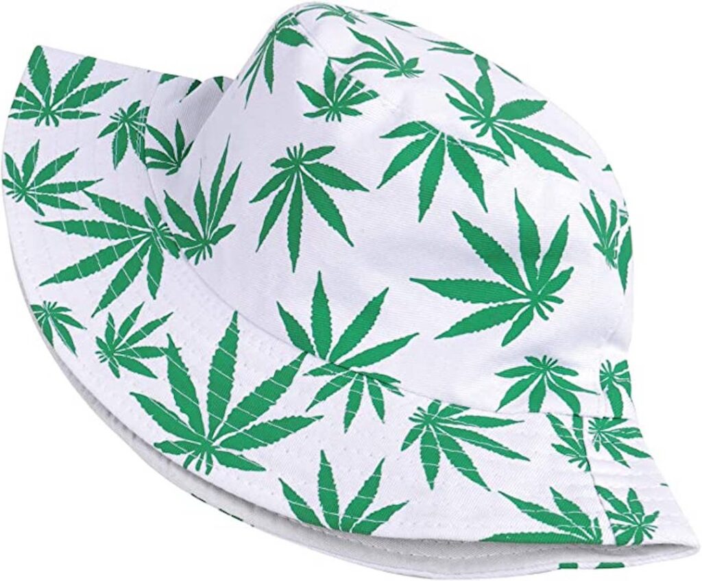 White bucket hat with green cannabis leaves on it
