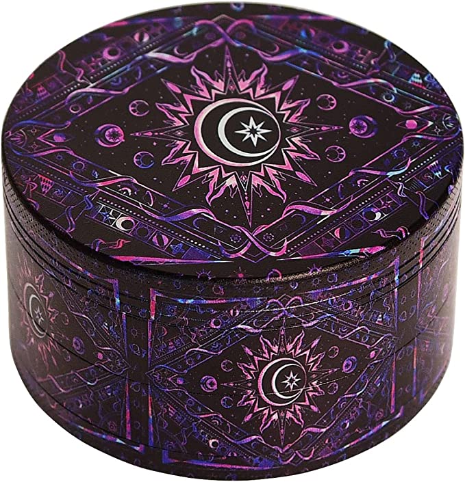 purple and black weed grinder with a heavenly design