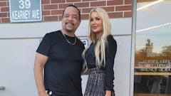 Ice-T and partner Charis B take photo in front of Jersey City office building after receiving approval to open The Medicine Woman dispensary. (Courtesy of The Medicine Woman)