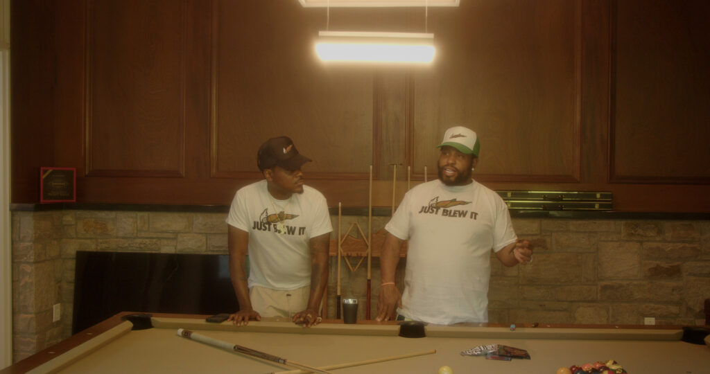 Luka Brazi speaks to Mikhail Harrison at The GUMBO estate in New York. (Jon Bain / Leafly)