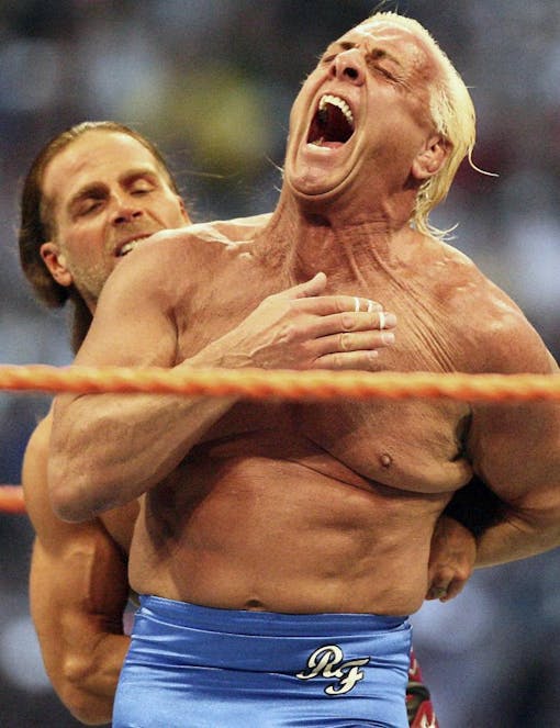 Ric Flair right, reacts as Shawn Michaels puts him in a hold during the Career Threatening Match at WrestleMania XXIV at the Citrus Bowl in Orlando, Fla. Flair, whose “Wooooooo!” call during promos and matches became one of the most imitated catchphrases in sports, thought he would die. Alive, and with a new lease on life, Flair tells The Associated Press he''s done drinking and vows to clean up his act with whatever time he has left. (Jacob Langston — Orlando Sentinel via AP)