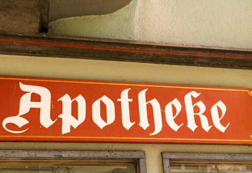 an orange sign with the inscription pharmacy in German