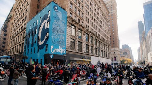 Now that’s how you make an Empire State entrance. Cookies’ NYC debut went down this weekend. Festivities included a Madison Square GUMBO tour bus and a local biker gang that shut down traffic. The wildest part? No cannabis was for sale–Just merch and accessories emblazoned with Cookies’ signature blue. Keep scrolling to see the highlights. (Cookies)