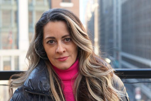 Kim Stetz, a co-owner of KeepItA100. Stetz is also a psychotherapist grounded in 30 years of Eastern spiritual practices with Western psychology.