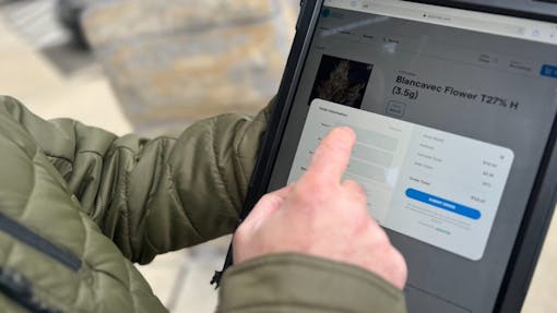 Connecticut customers use a tablet to pre-order legal cannabis from Affinity Dispensary. (Mikhail Harrison / Leafly)