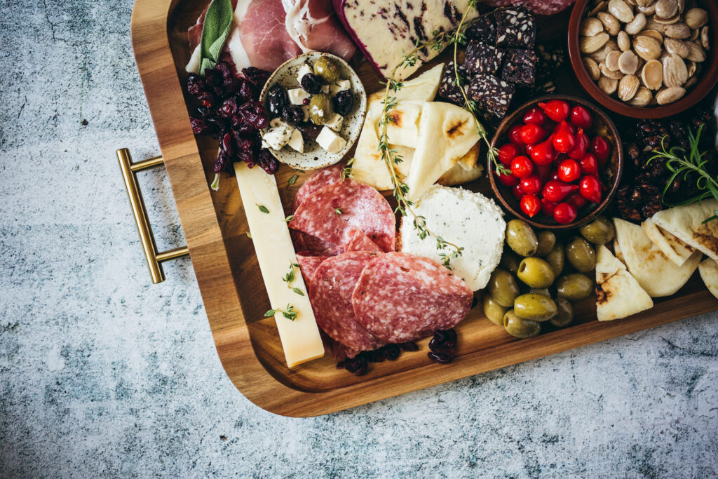 Sausage board with cheese and olives