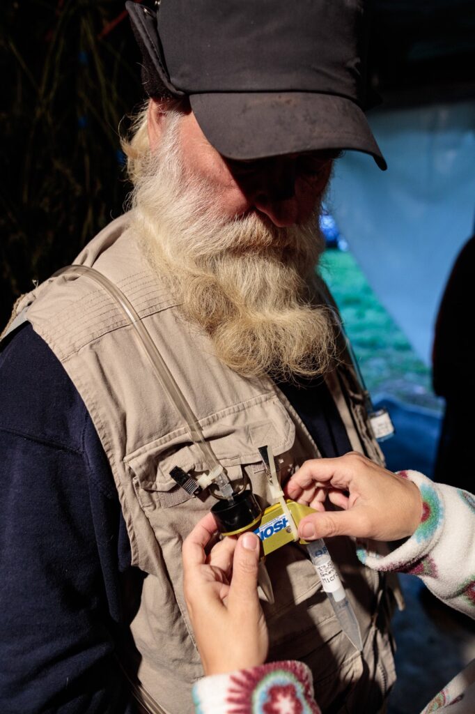 farmer-tom-lauerman-works-with-testing-equipment-from-NIOSH