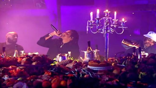 JAY-Z Grammy Awards 2023 performance last supper rapping into microphone. (Roc Nation / Twitter)