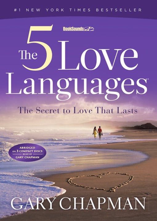 photo of the cover of the book The 5 Love Languages by Gary Chapman. the cover is purple with a couple walking in the distance along the sea