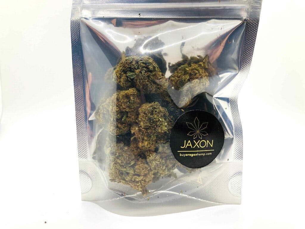 1/8 ounce bag of nugs with JAXON round sticker