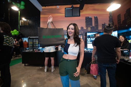 woman with shopping bag inside store