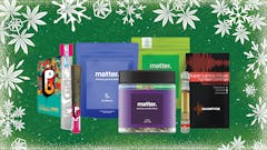a pre-roll and collection of multicolored packages of cannabis gummies, flower and vape carts, all from the brand "matter." against a green background with illustrations of white flowers and snowflakes around the border
