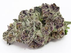 super frosty marijuana nug that is primarily deep purple with hints of green shining out from underneath