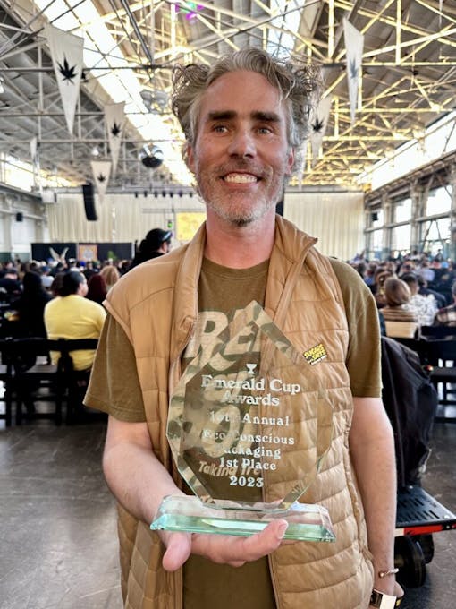 Talking Trees owner Craig Nejedly accepts an Emerald Cup award in 2023. (David Downs/Leafly)