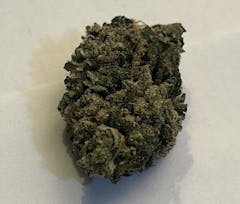 large, dense and bulbous forest-green nugs against a gray background