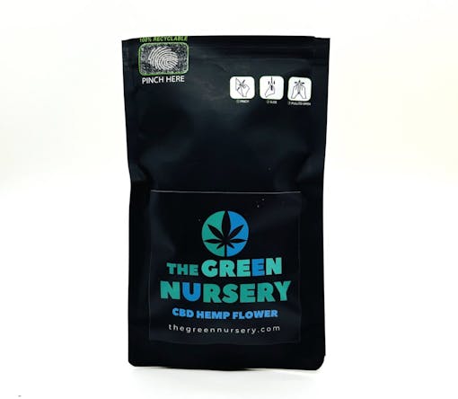 black bag with CBD flowers from The Green Nursery against a white background