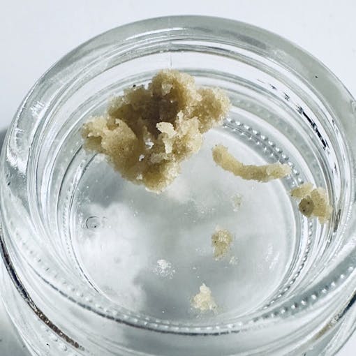 Blond, flaky, Mimosa solventless hash in a clear jar from Club La Selva, Barcelona, Spain. (David Downs/Leafly)