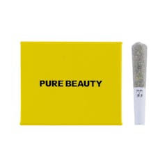 rectangular bright yellow package with black boxy brand name "PURE BEAUTY" in its center. to the right of the package, a single short pre-rolled joint.