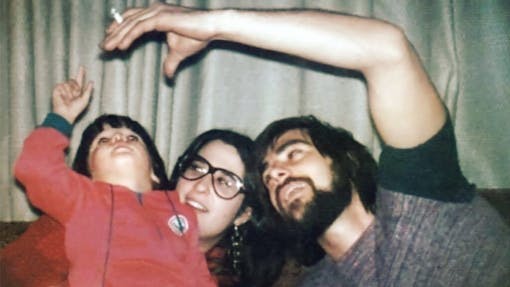 Nuna Harvest owner Howie Rondinone as a child with his parents. He reaches up for the joint his father is holding as his parents smile and hold it out of his reach.