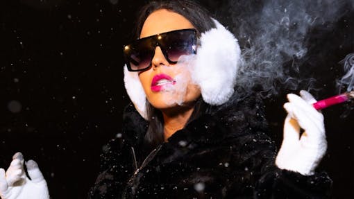 Blunt Brunch Boss Babe Parisa Mansouri-Rad smokes a pink rose bleeding during the New York City Fashion Week 2025 (with the kind permission of pink)