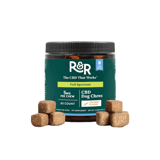 A green jar of CBD dog chews from R&R, our pick for the best CBD for dogs in the chews category. Two pyramid stacks for three chews sit on either side of the chews jar.