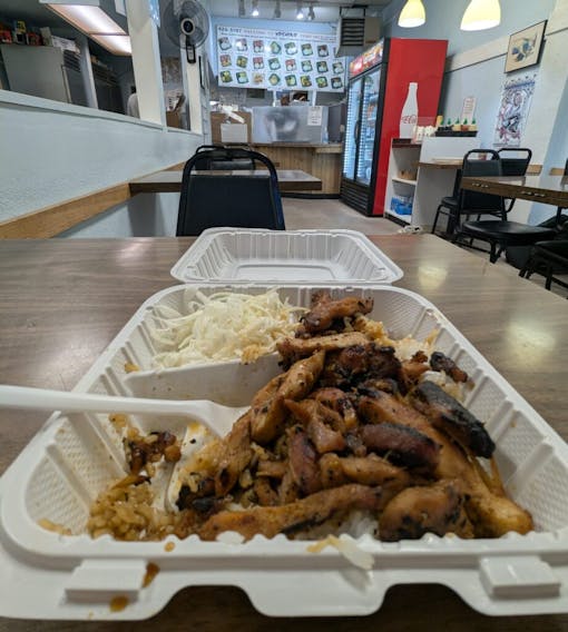 One of our picks for the best munchies in Seattle: Yoshino Teriyaki is pictured here in an open take out container taken inside the First Hill Seattle location.