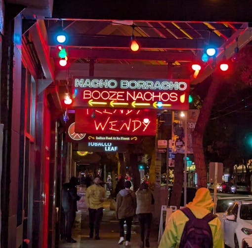 One of our best munchies in Seattle picks, this photo shows the neon sign outside of Seattle's Nacho Borracho location in Capitol Hill.